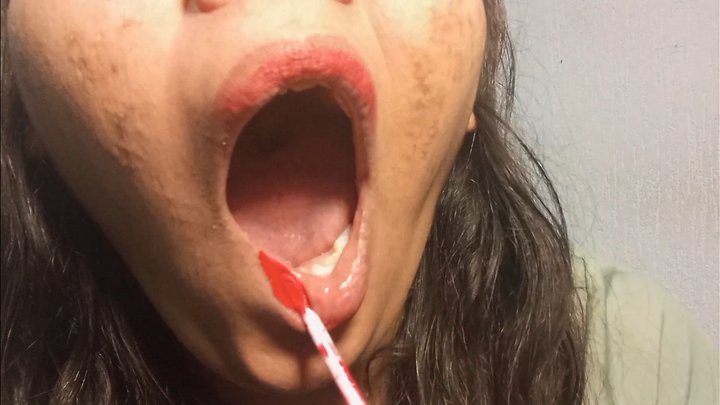 Red Liquid Lipstick Reapply and Slow Yawn Close Up