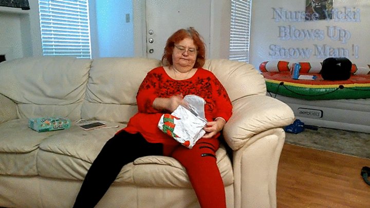 Bbw mature redheaded Nurse Vicki Blows up inflatable Snowman for you! Mp4