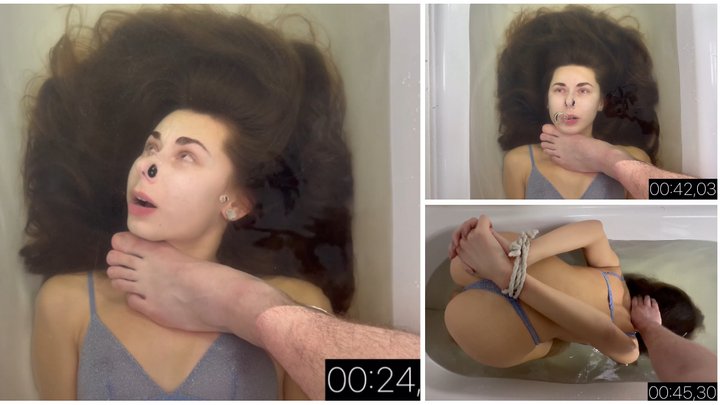 Practicing holding her breath underwater face up and face down (custom video)