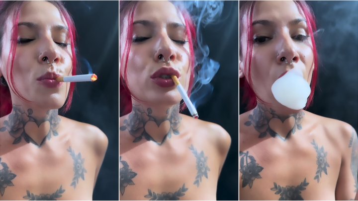 Emilia smoking a Marlboro red up close