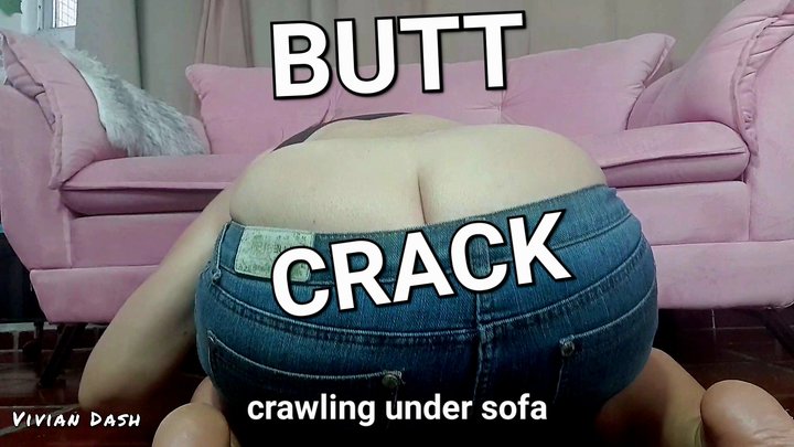 Buttcrack MILF crawls under sofa to show her big butt asscrack in jeans skirt