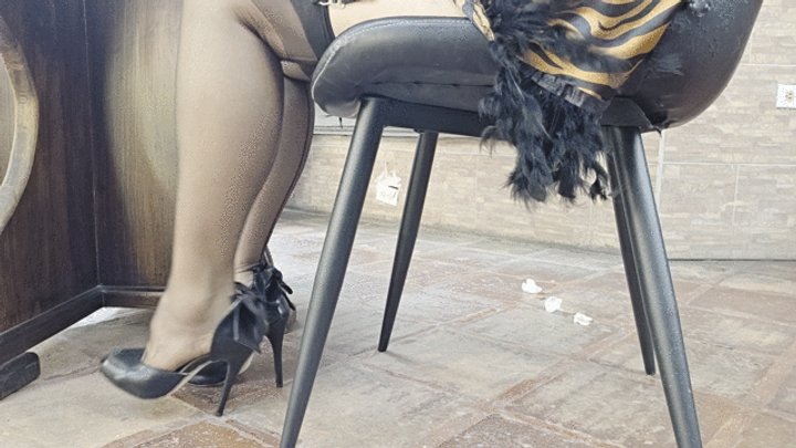 Milah Heel popping her divine feet in luxury pantyhose and sexy black heels