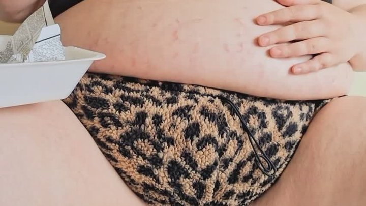 Feedee stuffs belly and gets undressed