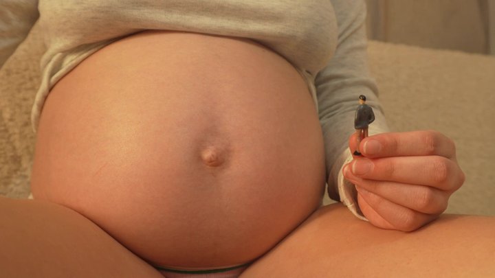 Giantess Girl shows her pregnant belly to Tiny's husband and then Tiny's husband