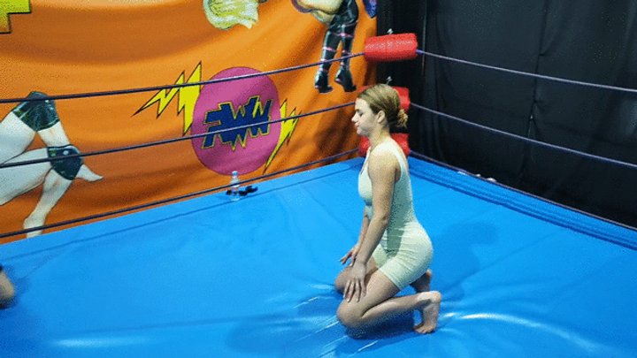 Passionate mixed wrestling match with camelclutch hold