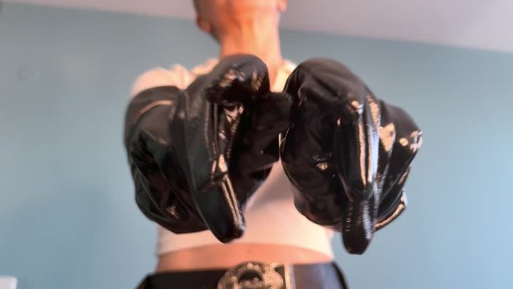 Blonde goddess enjoys her shiny gloves and real leather pants