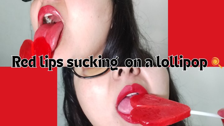 Red lips sucking on a lollipop