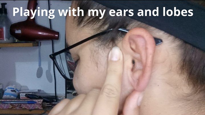 Playing with my ears and lobes