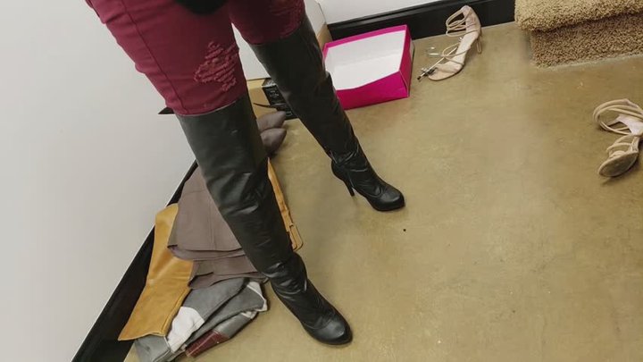 Jewels Trying On 2 Black Boots in Red Torn Jeans