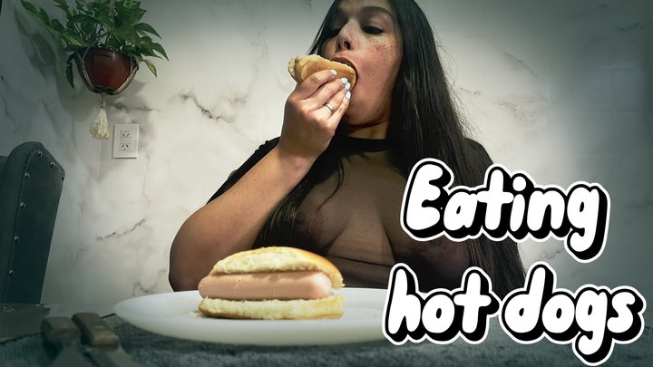 Eating hot dogs