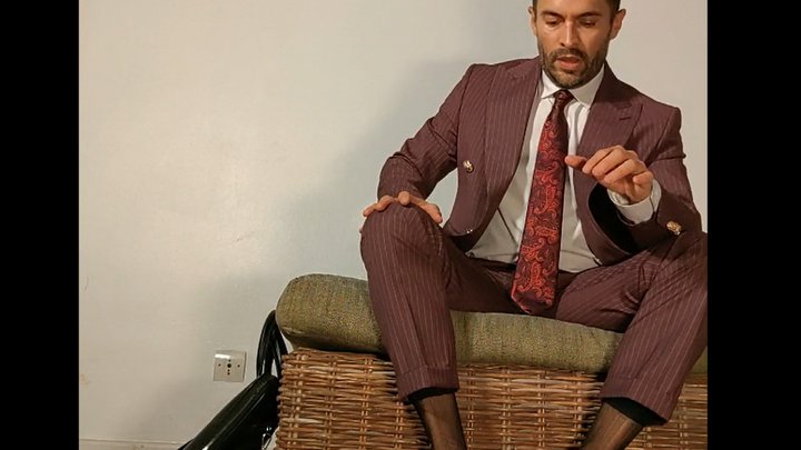 Gio in purple suit and sheer socks