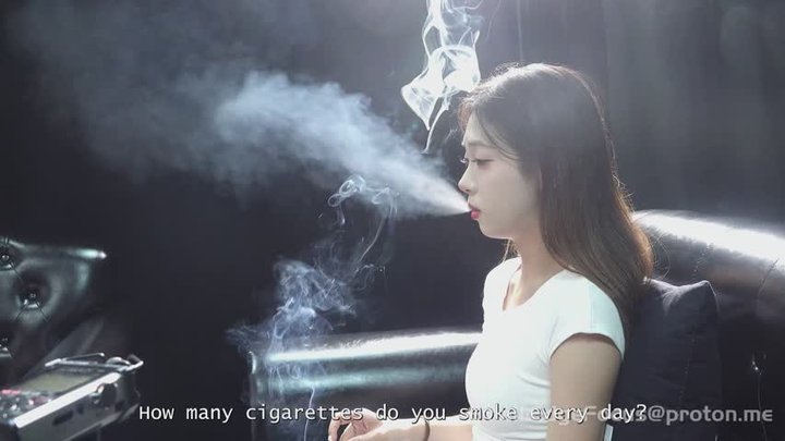 Sensual Asian Girl Cigarette Smoking Interview with Deep Inhales and Dense Smoke