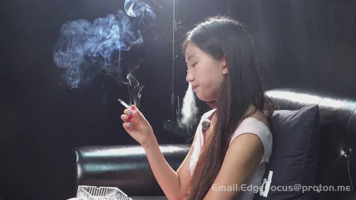 Elegant Asian Beauty Answers Intimate Smoking Q&A While Inhaling Deeply — NA1 4K