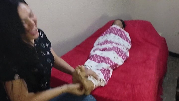 "KENYA IS TICKLED WHILE MUMMIFIED AND WRAPPED"