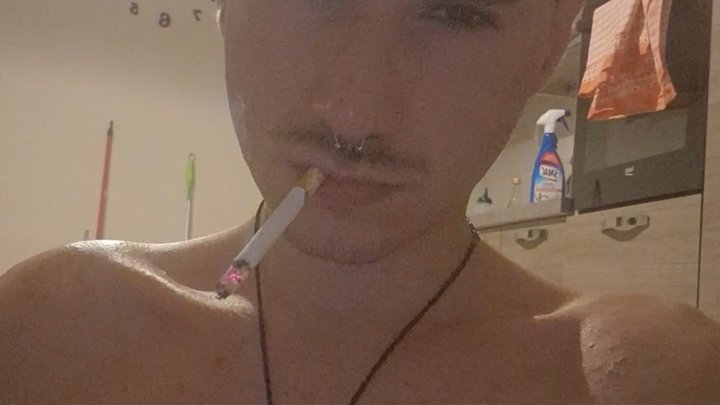 Cute boy smokes first cigarette in your face