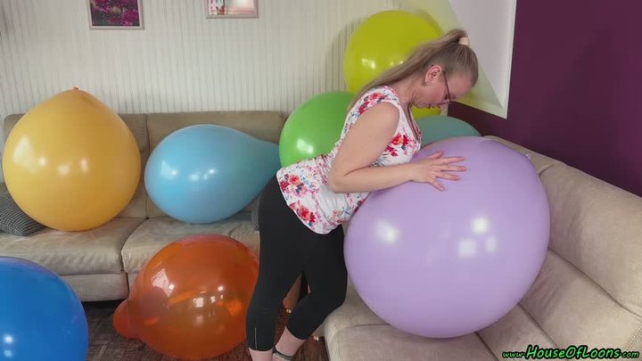 sexy teasing and popping balloons with fingernails and wooden stick and topless