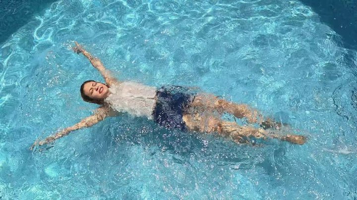 SWIMMING WITH CLOTHES