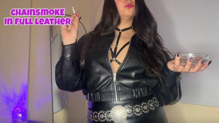 Fast chainsmoking in full leather outfit: leather jacket and pants