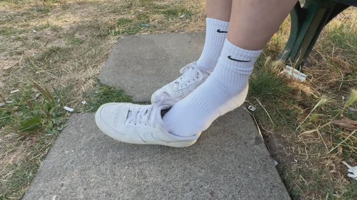 Shoeplay in Nike Air AF1 Sneakers at the park