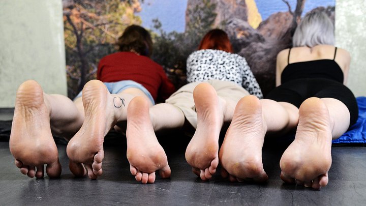 A parade of wrinkled soles on the floor from Anastasia, Vitaliya, and Zlata (Par