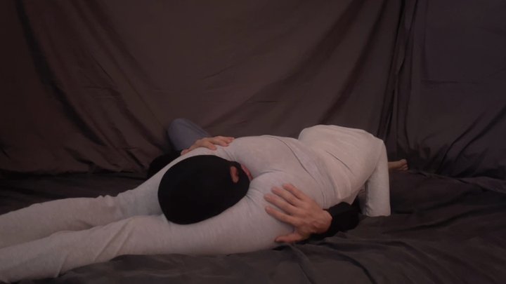 Headscissors on a guy while he is gasping for air and making him tap
