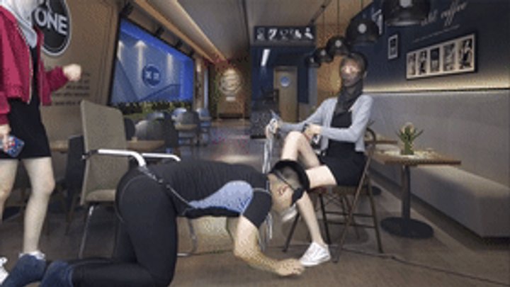The female boss is playing with slaves, trampling and lick feet in the coffee sh