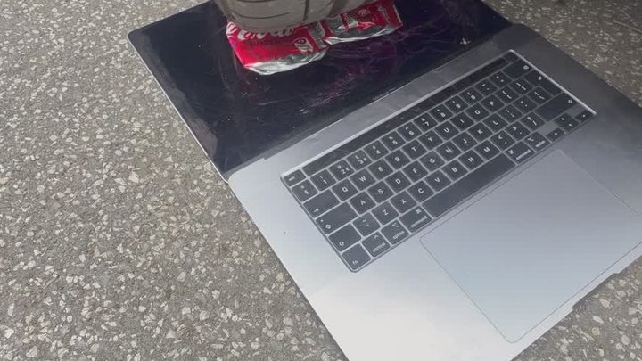 BMW 330e Drives Over MacBook & Cans in Huge Platform Boots