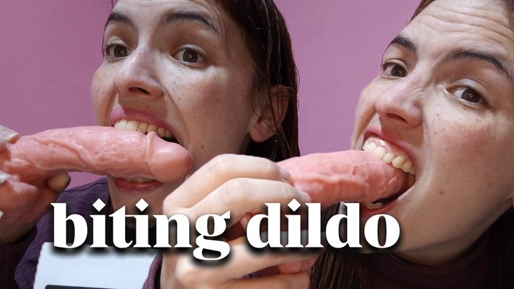 Biting my dildo really hard with my teeth!!