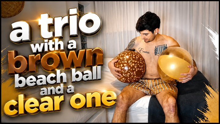 a trio with a brown beach ball and a clear one