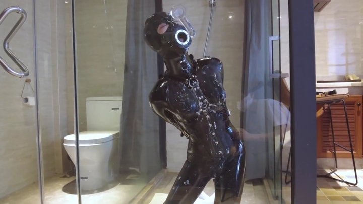 A puppy in leather restraints, bound in the bathroom. Licking you, getting it al