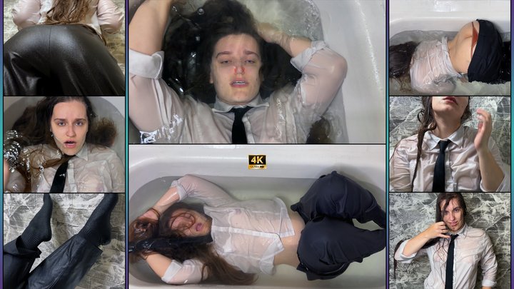 Secretary in Trousers and Socks Blows Bubbles Underwater in Bathtub 4K - Wet Clo