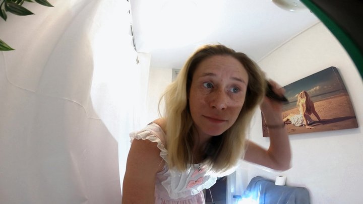 Danielle Brushing Her Hair In The Mirror 7
