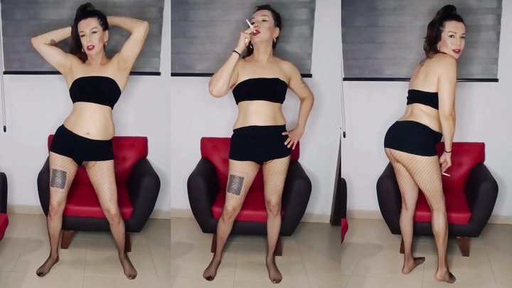 Trans milf smokes while dancing