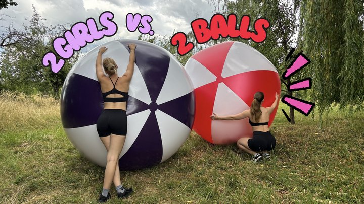 2 girls vs. 2 giant beach balls