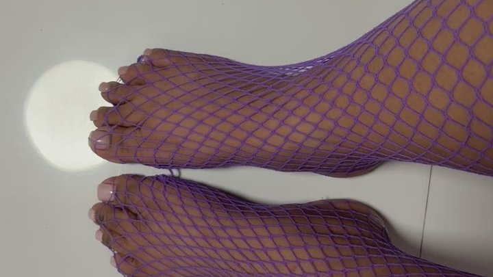 Foot flexing and toe spreading Purple Fishnets top view