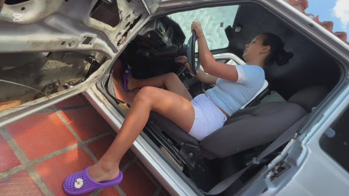 Dalilah is desperate to start the old car