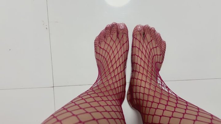 Red Fishnets toe wiggling from Top view
