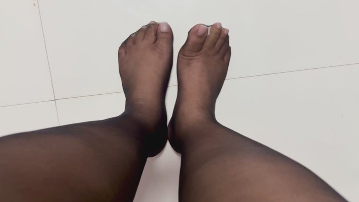 Cath wearing ultra-thin black nylon stockings