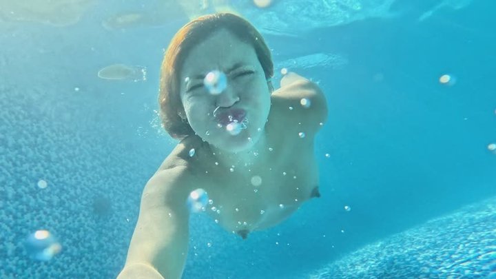 SWIMMING NAKED IN THE POOL