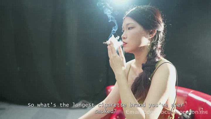 Glamorous Asian Beauty Smoking Cigarettes on Red Velvet Leather Armchair — JIA2 