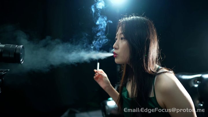 Sultry Smoking Girl in Green Silk Exhales Thick Clouds in Intense Studio Session