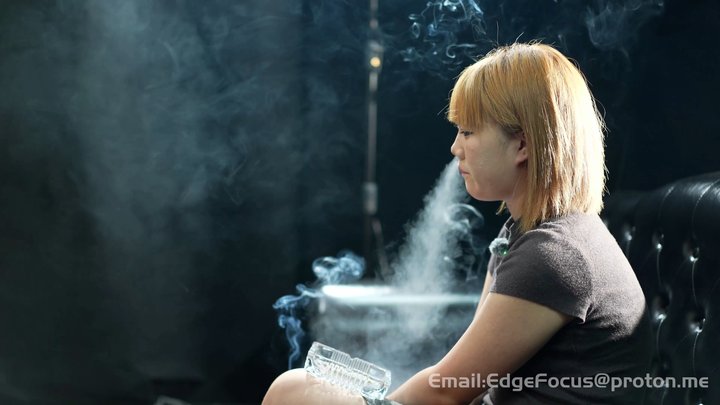 Sensual Smoking Girl: Deep Inhales and Thick Smoke Clouds on the Leather Sofa ——