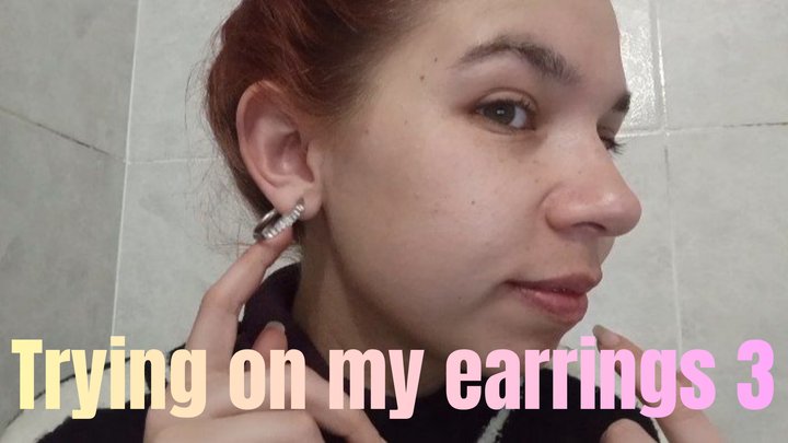 Trying on my earrings 3
