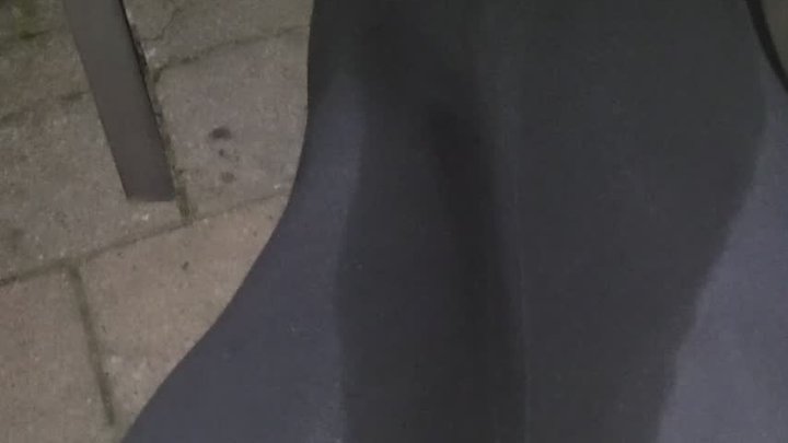 Peeing black leggings outside