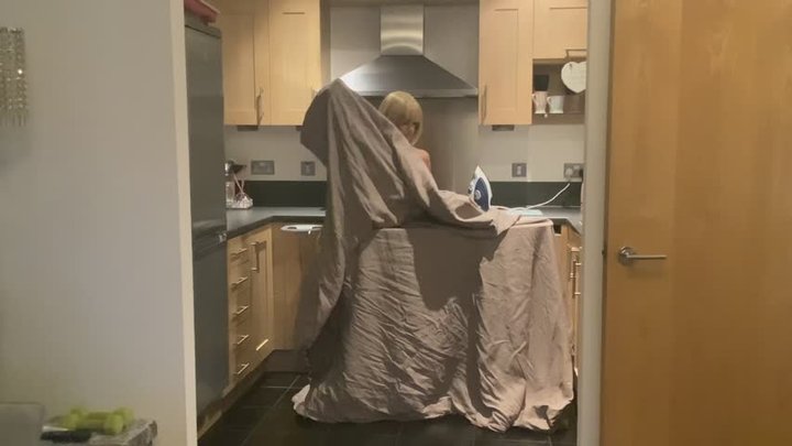 Steamy Nights: Naked Ironing Fetish