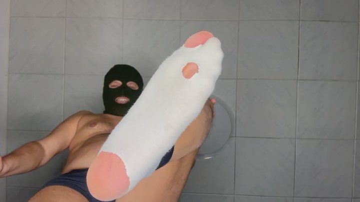 The giant humiliates you with his holey socks