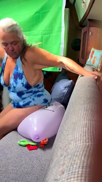 A super sexy blonde with big boobs and masturbating with a v
