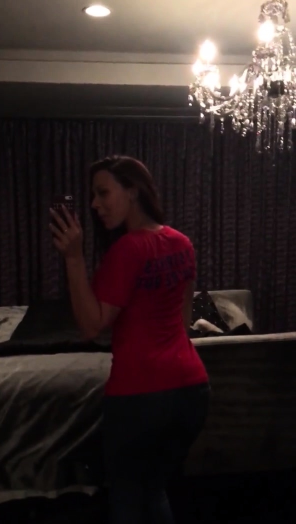 Rachel Starr shakes her dandelion