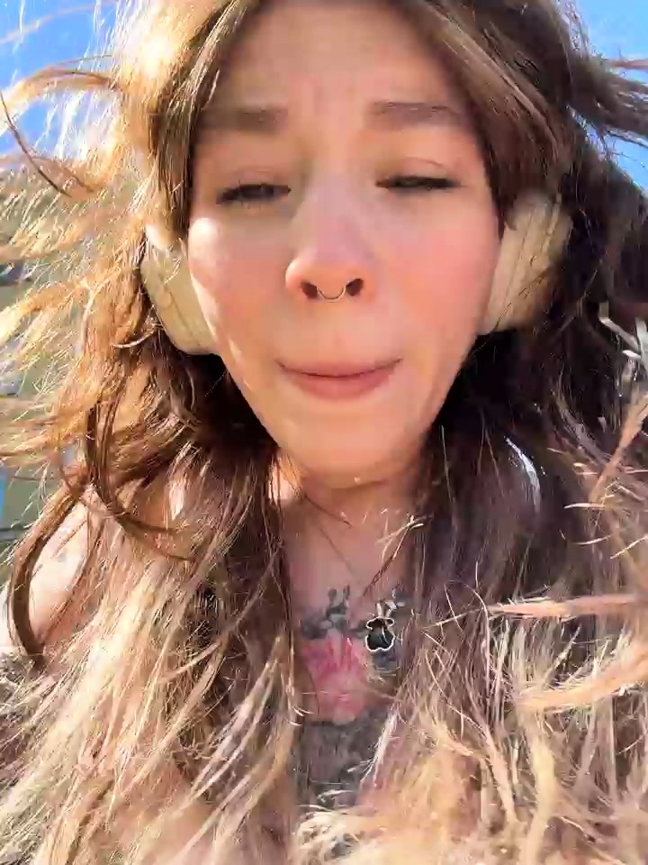 Flirty Tattooed Girl Shows Off Big Tits in Public