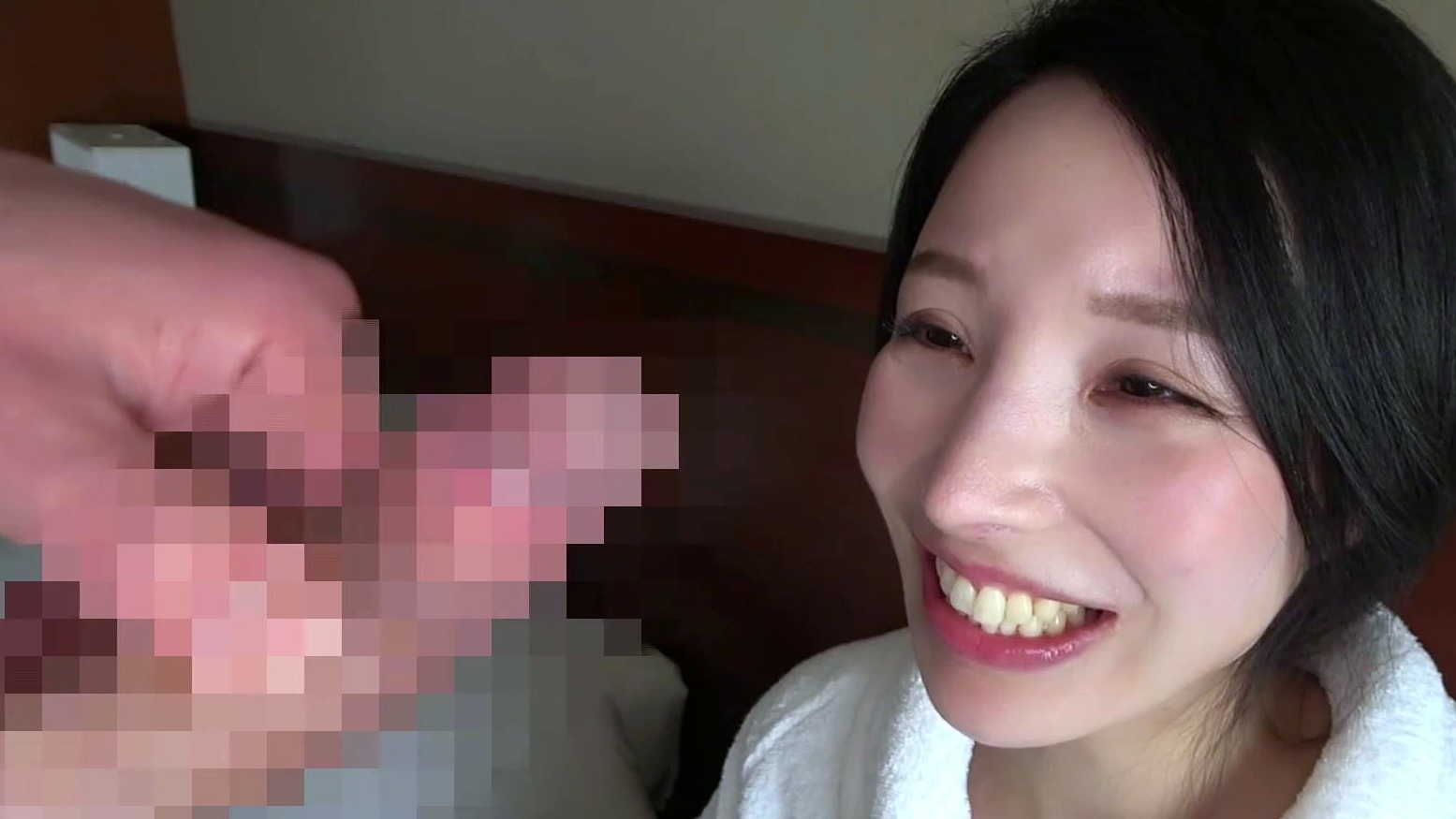 Japanese MILF with big smile watches lucky guy masturbate